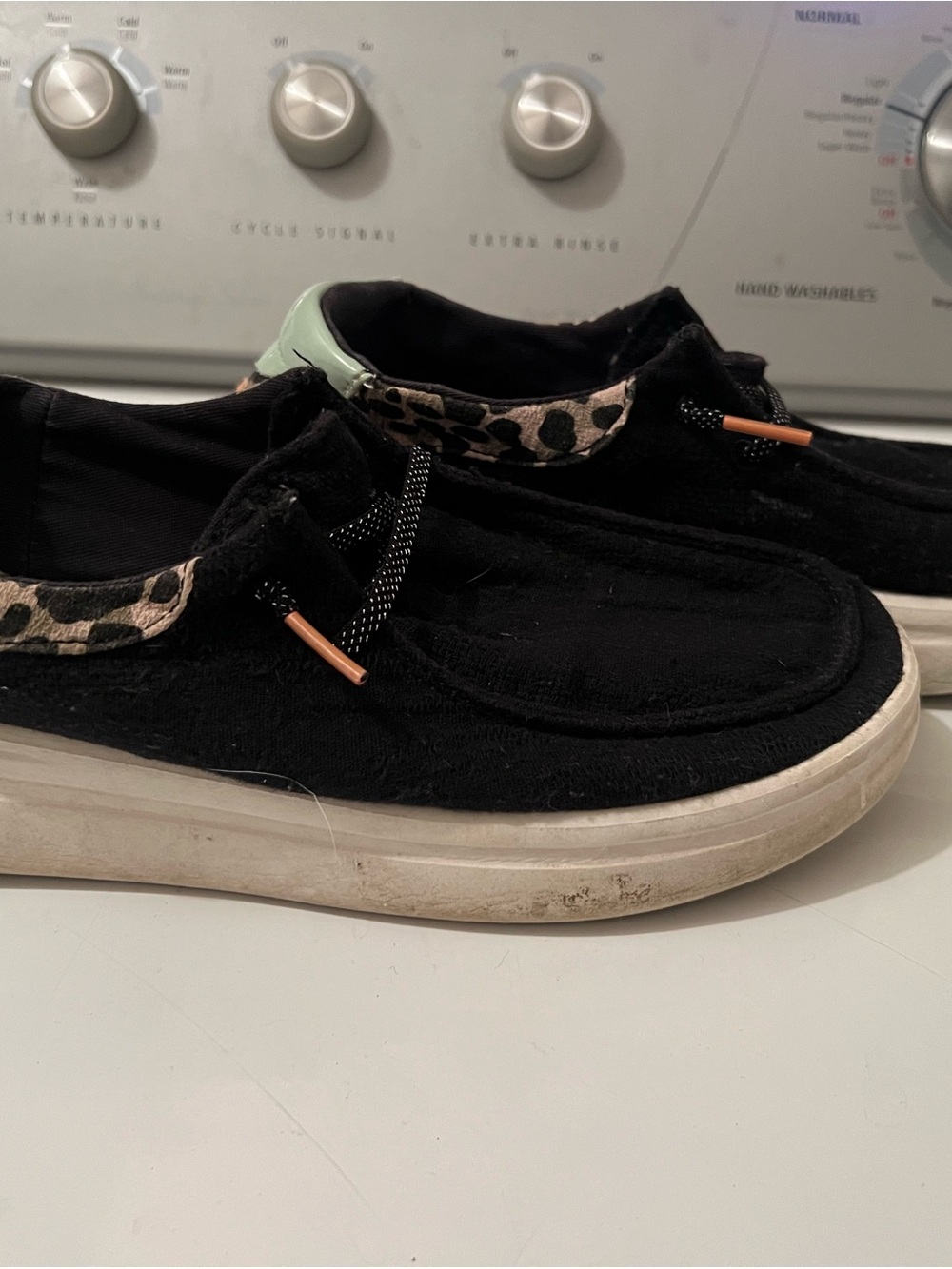 Hey Dude Black Slip-On Sneakers with Leopard Trim and Mint Heel